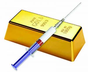 Gold bar and syringe