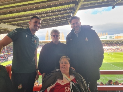 Maria, her dad Mervyn Edwards, Rory Watson and Humphrey Ker at Wrexham AFC