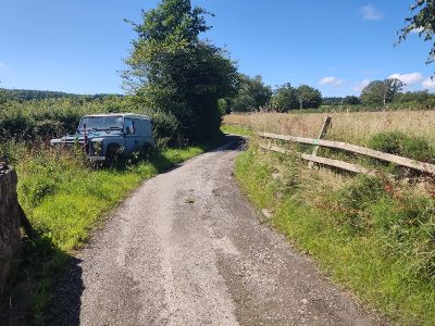 (4) Abandoned Land Rover - public footpath sign to the right