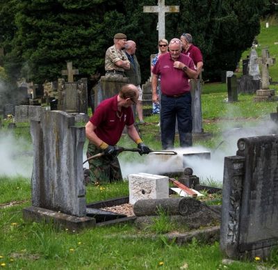 Cleaning Percy's grave
