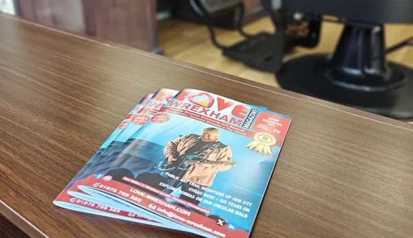 Love Wrexham June 2025 magazines at Johnstown Turkish Barber Shop