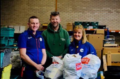 Tesco employees in Wrexham pose for photo