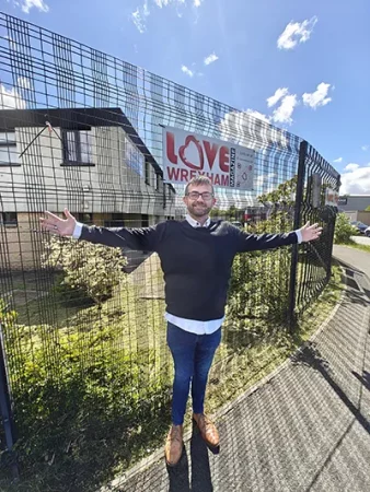 Kev Edwards, Commercial Director, in front of the Love Wrexham office location on the Vauxhall Industrial Estate in Ruabon