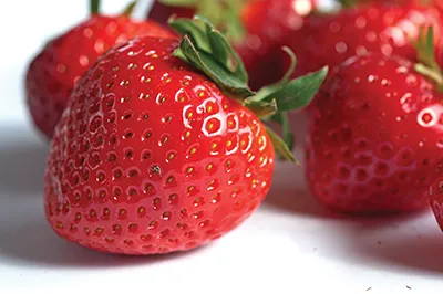 Close-up of several strawberries
