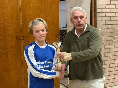 Community Sport, Football and Local Services in Focus Across Cefn Mawr - One of the Ken Bathers tournament participant receives a trophy