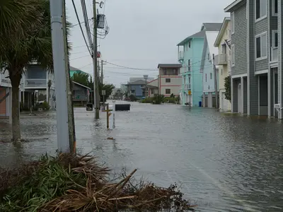 A flooded housing area - Protecting Your Outdoor Space From Extreme Weather
