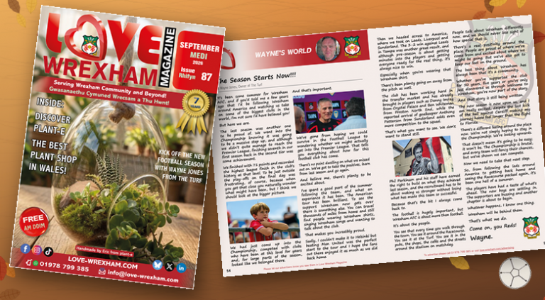 Front cover of the September 2026 Love Wrexham Magazine alongside the Wayne's World feature spread on Wrexham AFC, set against an autumn leaves background