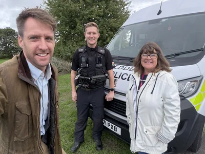 Sam Rowlands MS, PC Mark Hughes and Cllr Debbie Wallice at Borras Park – Borras Park Safer Neighbourhood Event Brings Residents and Police Together