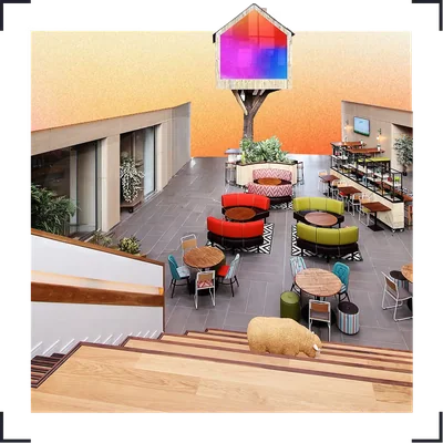 Colourful open plan breakout area inside Moneypenny’s Wrexham headquarters – DS Edit: Moneypenny Launches a Workplace Fashion Library