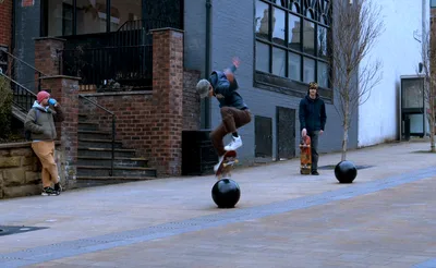 Skateboarder mid-jump in Wrexham city centre – Three Generations: New Documentary Celebrates the People and Culture of Wrexham