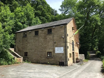 Stone-built Nant Mill visitor centre beside the woodland path in the Clywedog Valley – Year of Wonder Dog Walks: Autumn Walks Near Wrexham
