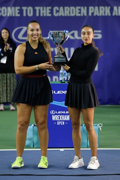 Freya Christie and Eden Silva With the Doubles Trophy - Hannah Klugman Crowned Champion as Lexus Wrexham Open Serves Up a Week to Remember British doubles champions Freya Christie and Eden Silva holding the Lexus Wrexham Open doubles trophy on court